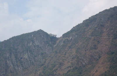 The Sun Gate temple - Intipunku, from Machu Picchu The Sun Gate temple - Intipunku, from Machu Picchu